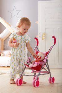 HABA 303815 - Puppenbuggy Jule, Buggy, 63x25cm, rosa-rot [220486257] -  22,95  - www.MOLUNA.de - Entdecken - Einkaufen - Erleben