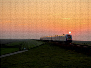 CALVENDO Puzzle Die Nordostseebahn im Sonnenuntergang 1000 Teile Puzzle quer