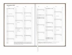 Terminer A5 2023. Sand-farbener Terminkalender mit hochwertigem Leineneinband. Wochenplaner mit Zitaten und Lesebändchen. Taschenkalender 2023 zum Planen von Terminen